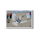 a picture of a bird painted on the side of a building
