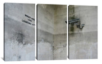 three panels of a wall with graffiti on them