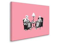 a couple of people sitting in a chair next to a lamp