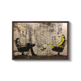 a picture of a man sitting in a chair next to a banana