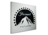 a picture of a mountain with stars around it