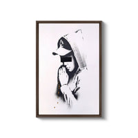 a black and white photo of a person wearing a hat
