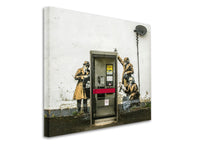 a phone booth with a painting of soldiers on it