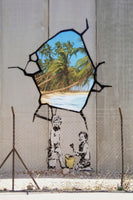 a painting on a wall with a picture of a family on it
