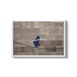 a picture of a bird sitting on a barbed wire