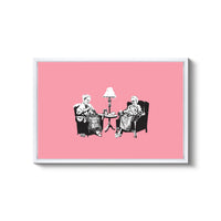 a couple of people sitting in chairs next to a lamp