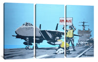 a painting of a fighter jet on the deck of an aircraft carrier