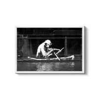 a black and white photo of a man in a boat