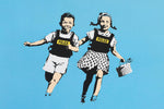 a couple of people that are jumping in the air