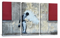 a painting of a man writing on a wall