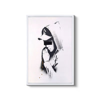 a black and white photo of a person wearing a hoodie