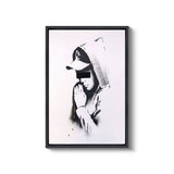 a black and white photo of a person wearing a hoodie