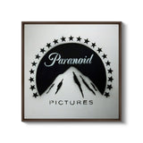 a black and white picture of a mountain with stars