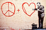 a brick wall with a painting of a man with a peace sign painted on it