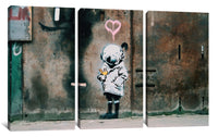 a painting of a person with a heart on the side of a building