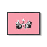 a couple of people sitting in chairs next to a lamp