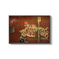 a picture of a man sitting in front of a wall covered in graffiti