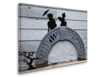 a wall with a painting of a man and a woman holding an umbrella