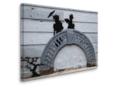 a wall with a painting of a man and a woman holding an umbrella