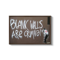a man standing in front of a blackboard with graffiti on it