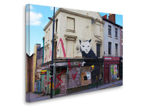 a building with graffiti on the side of it