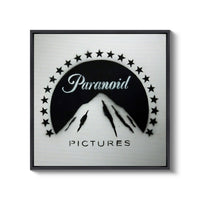 a black and white picture of a mountain with stars