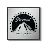 a black and white picture of a mountain with stars