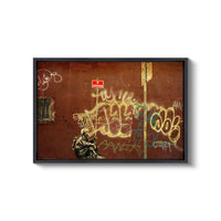 a picture of a man sitting in front of a wall covered in graffiti