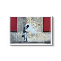 a painting of a man writing on a wall