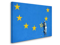 a man painting the european flag on a wall