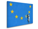a man painting the european flag on a wall