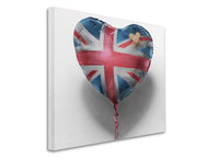 a heart shaped balloon with the british flag painted on it