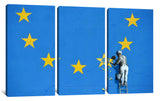 a man painting a wall with stars on it
