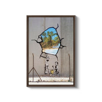 a picture of a broken glass window with a picture of a beach in the background